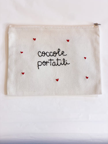 Pochette ricamata a mano