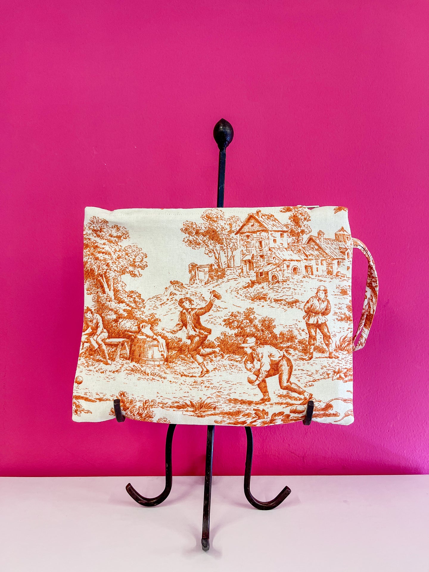 Rust Toile de Jouy clutch bag