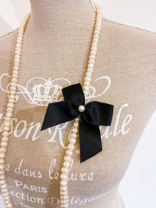 Collana perle e fiocco