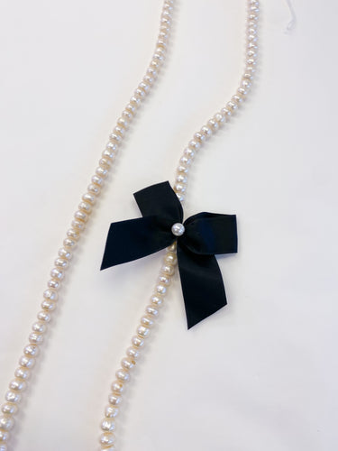 Collana perle e fiocco