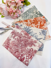 Load image into Gallery viewer, Rust Toile de Jouy clutch bag
