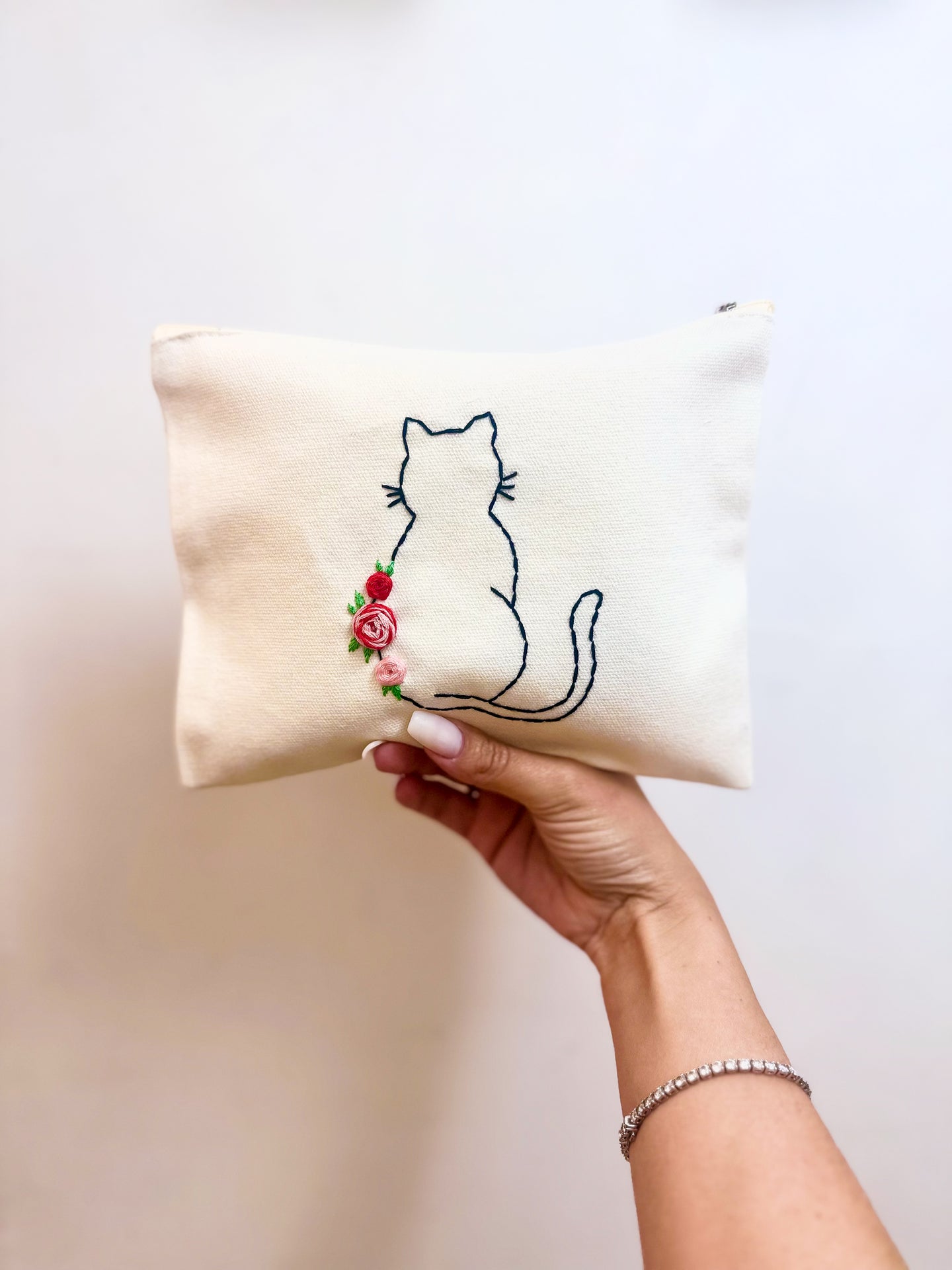 Pochette ricamata a mano