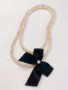 Collana perle e fiocco