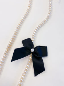 Collana perle e fiocco