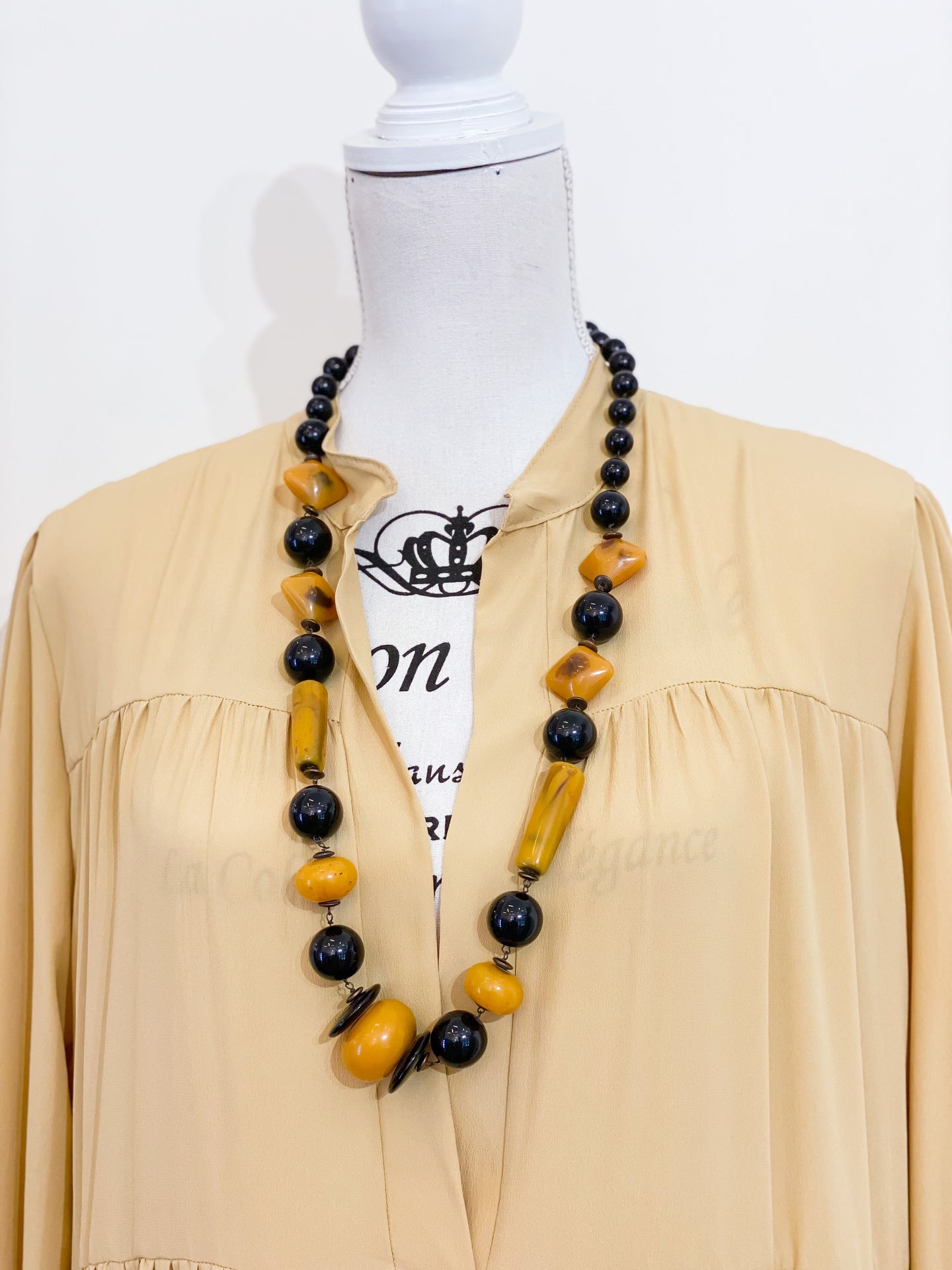 Medium length ethnic necklace.