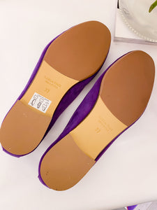 Handcrafted moccasins in purple suede